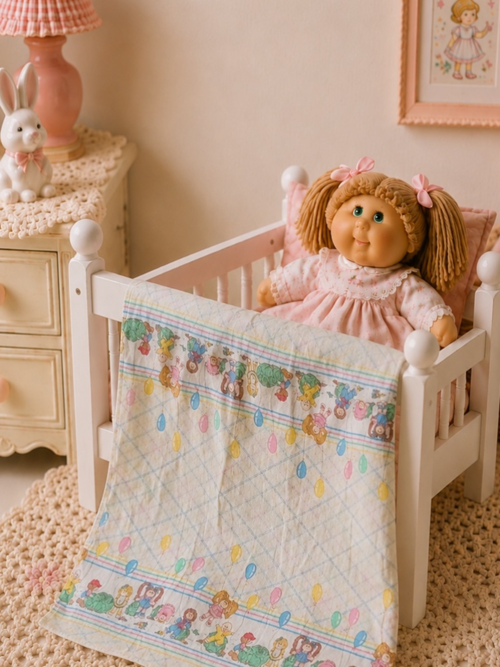 Vintage 1983 Cabbage Patch kids receiving blanket